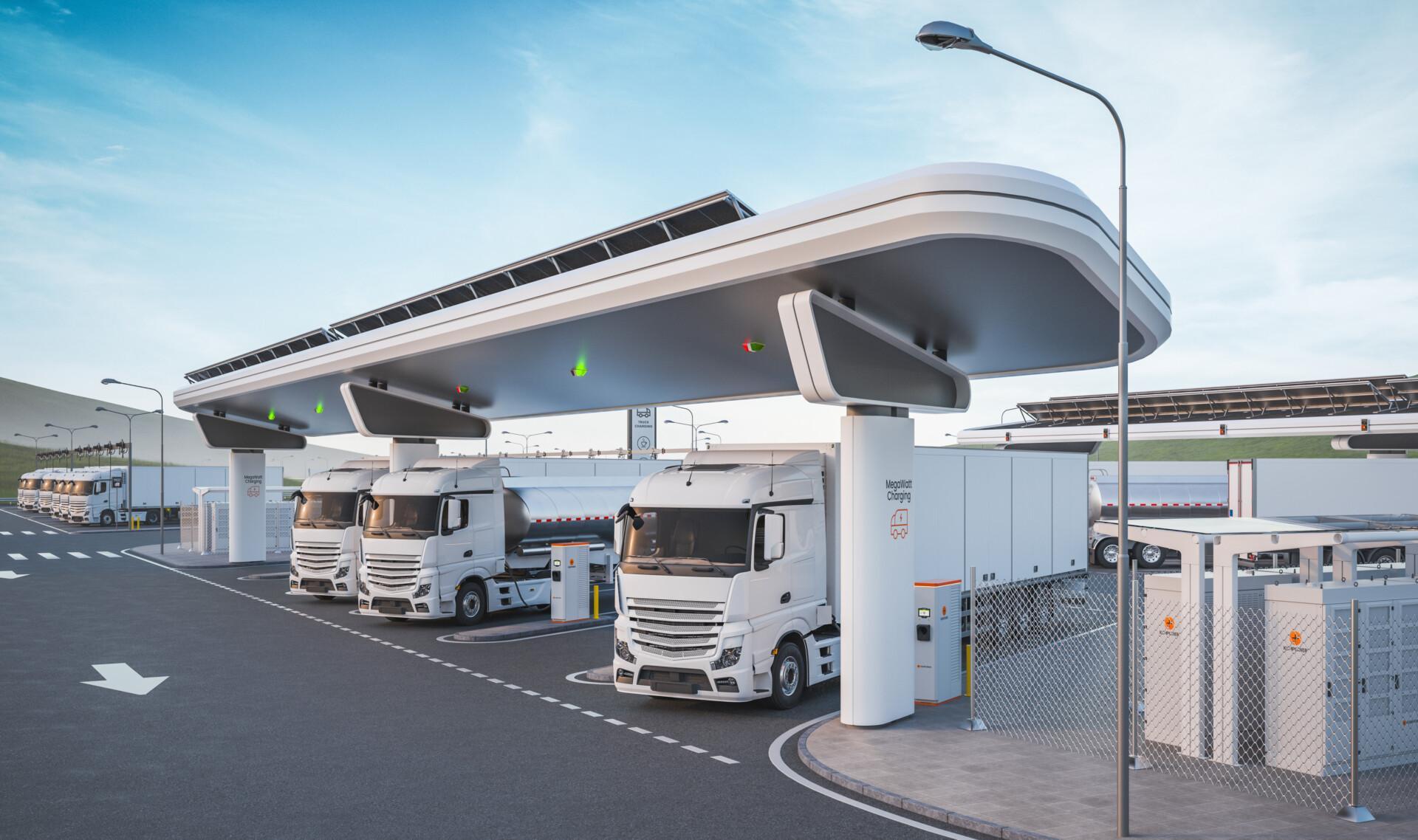Electric trucks are charging at a modern, elevated charging station with solar panels on the roof, under a clear blue sky. there is ample infrastructure indicating advanced technology in transportation.